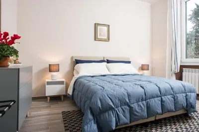 Letto o letti in una camera di Orsini Family Deluxe Apartment by Mamo Florence