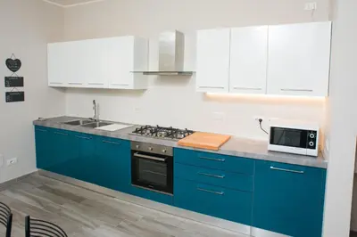 Cucina o angolo cottura di Orsini Family Deluxe Apartment by Mamo Florence
