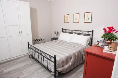 Letto o letti in una camera di Orsini Family Deluxe Apartment by Mamo Florence