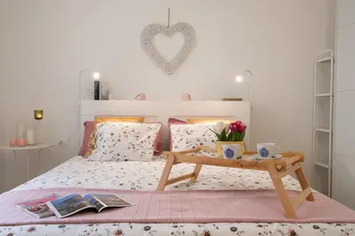 Letto o letti in una camera di Angelico Apartment