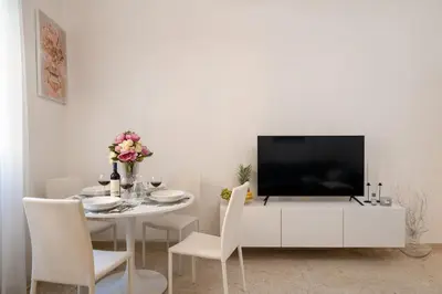 TV o dispositivi per l'intrattenimento presso Angelico Apartment