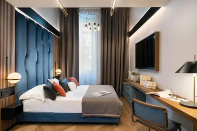 Letto o letti in una camera di Arts & Crafts Apartments