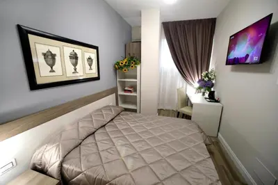 Letto o letti in una camera di FLORENCE ROOMS67
