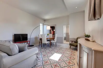 Area soggiorno di Zante Apartment by Mamo Florence