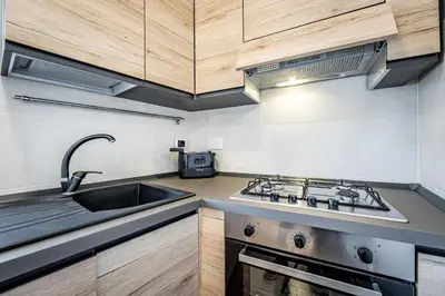 Cucina o angolo cottura di Roommo Via dei Pilastri giada