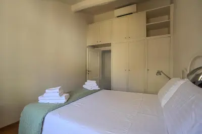 Letto o letti in una camera di Giorgio Ponte Vecchio Apartment
