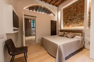Letto o letti in una camera di La Bottega del Ferro by Mmega