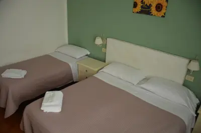 Letto o letti in una camera di Hotel Cordova