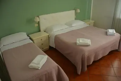 Letto o letti in una camera di Hotel Cordova