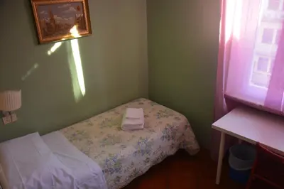 Letto o letti in una camera di Hotel Cordova
