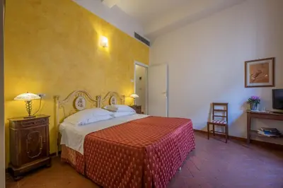 Letto o letti in una camera di B&B Home in Florence