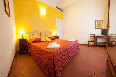 Letto o letti in una camera di B&B Home in Florence