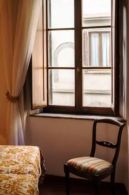 Letto o letti in una camera di Residenza dei Medici Palace Costanza