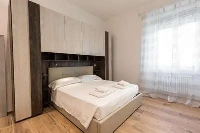 Letto o letti in una camera di Casa Vittoria by Mmega