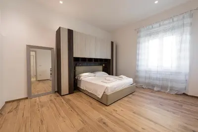 Letto o letti in una camera di Casa Vittoria by Mmega