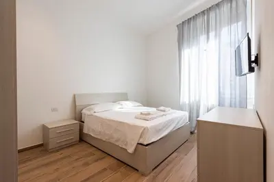 Letto o letti in una camera di Casa Vittoria by Mmega