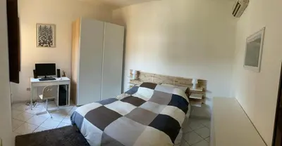 Letto o letti in una camera di Casa di Abe