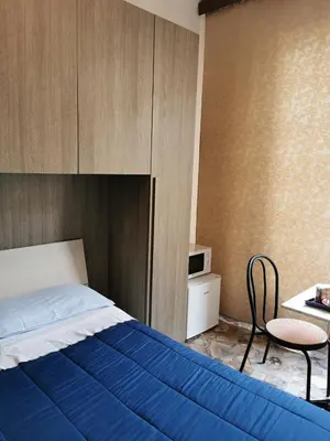 Letto o letti in una camera di Affittacamere Sciacchithouse