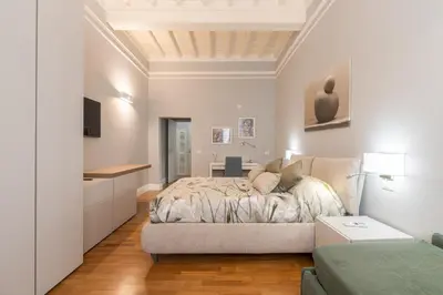 Letto o letti in una camera di Firenze Rentals Deluxe Corso 5