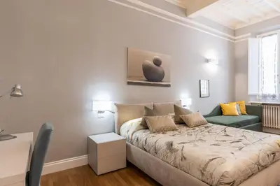 Letto o letti in una camera di Firenze Rentals Deluxe Corso 5