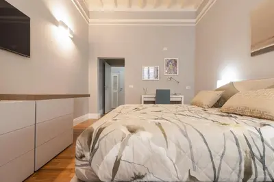 Letto o letti in una camera di Firenze Rentals Deluxe Corso 5