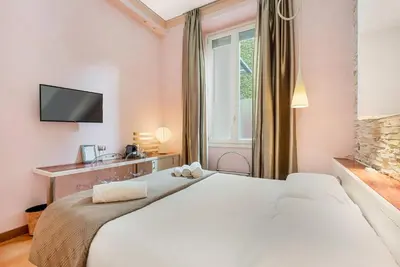 Letto o letti in una camera di Aurora Garden Lodging - Rooms & Apartment