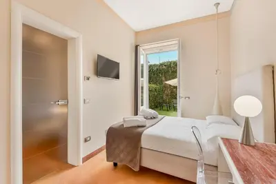 Letto o letti in una camera di Aurora Garden Lodging - Rooms & Apartment