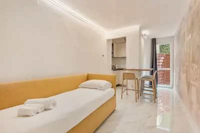 Area soggiorno di Aurora Garden Lodging - Rooms & Apartment