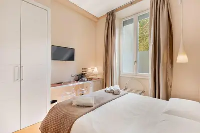 Letto o letti in una camera di Aurora Garden Lodging - Rooms & Apartment
