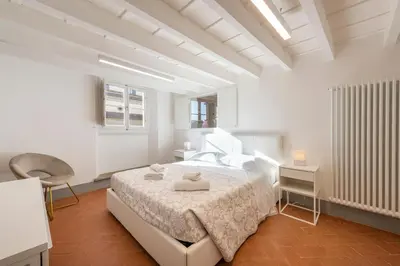 Letto o letti in una camera di Santo Spirito View by Mmega