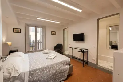 Letto o letti in una camera di Santo Spirito View by Mmega