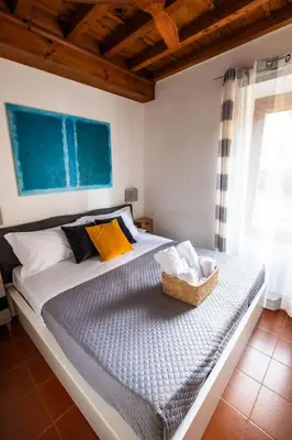 Letto o letti in una camera di Appartamento Galileo