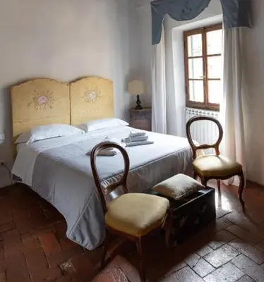 Letto o letti in una camera di Florence Medici Apartment