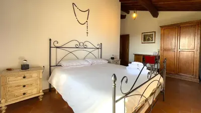 Letto o letti in una camera di Loretta - Private holiday apartment with shared pool