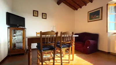 TV o dispositivi per l'intrattenimento presso Loretta - Private holiday apartment with shared pool