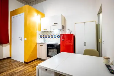 Cucina o angolo cottura di Roommo Pergola Apartment