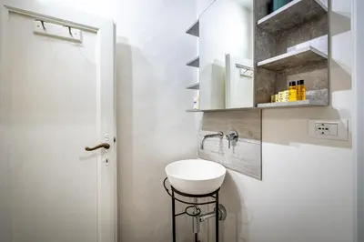 Bagno di Roommo Pergola Apartment