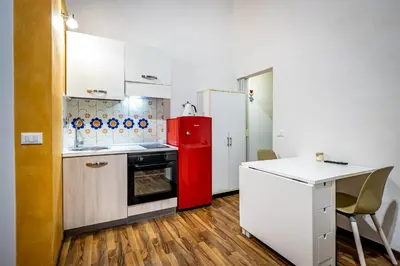 Cucina o angolo cottura di Roommo Pergola Apartment