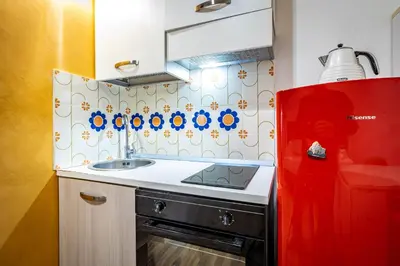 Cucina o angolo cottura di Roommo Pergola Apartment