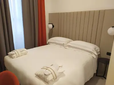 Letto o letti in una camera di BB Hotels Smarthotel Derose