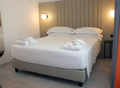 Letto o letti in una camera di BB Hotels Smarthotel Derose