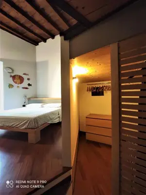 Letto o letti in una camera di CAREGGI GARDEN APARTMENT