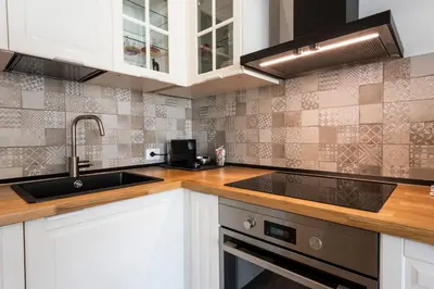 Cucina o angolo cottura di Ruote Stylish Loft by Mmega