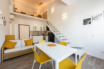 Cucina o angolo cottura di Ruote Stylish Loft by Mmega