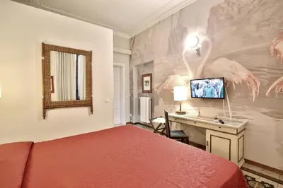 TV o dispositivi per l'intrattenimento presso MADAMA GUEST HOUSE