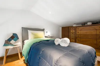 Letto o letti in una camera di FLORENCE GIANNOTTI HOME