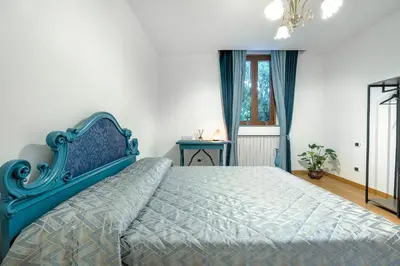 Letto o letti in una camera di FLORENCE GIANNOTTI HOME