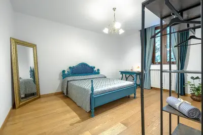 Letto o letti in una camera di FLORENCE GIANNOTTI HOME