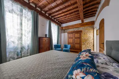 Letto o letti in una camera di Il Giardino Fiorentino - Luxury Apartment & Spa