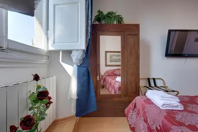 Letto o letti in una camera di Cappelle Medici